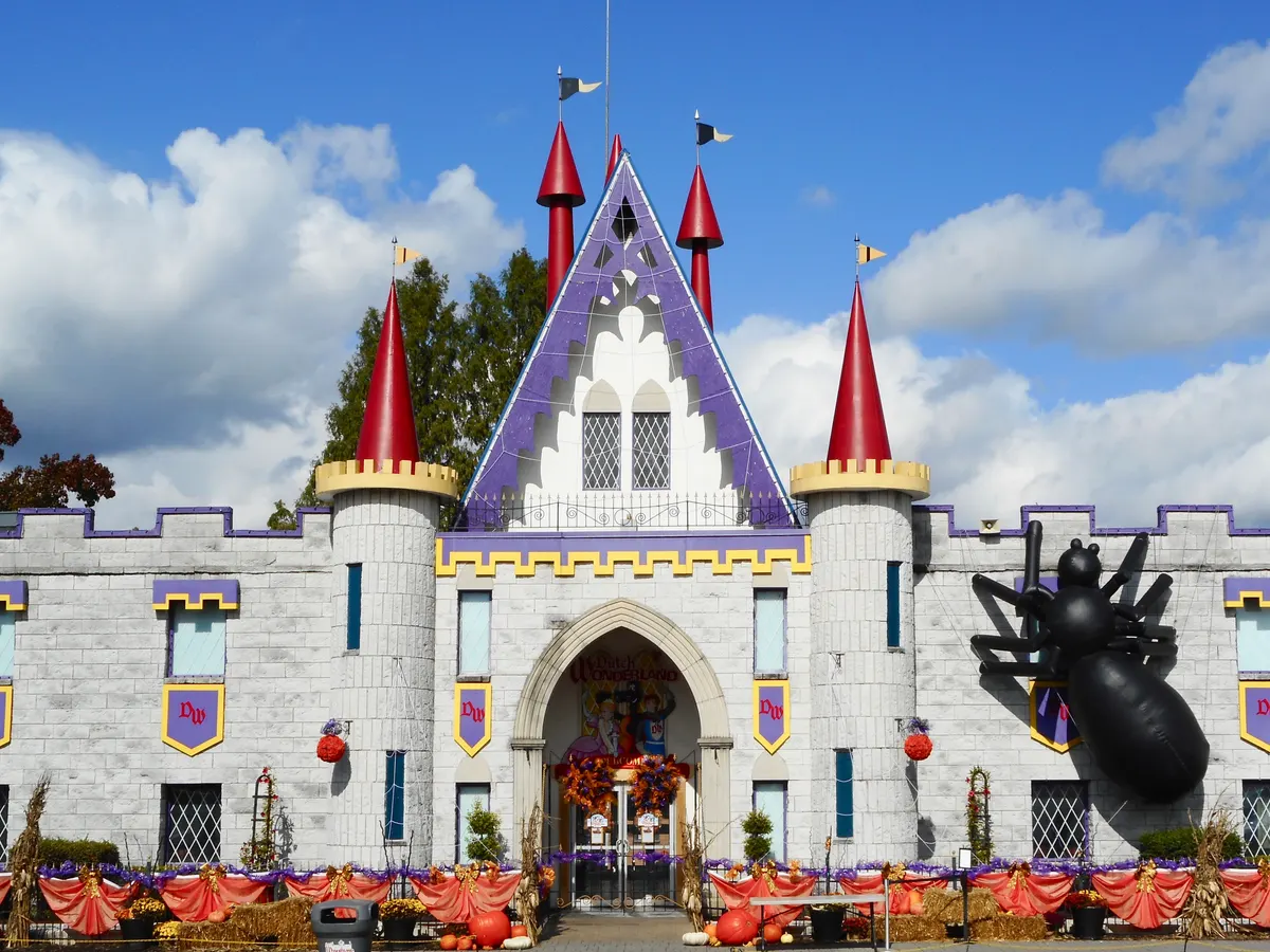 Dutch Wonderland's castle entrance with a large Halloween spider decoration