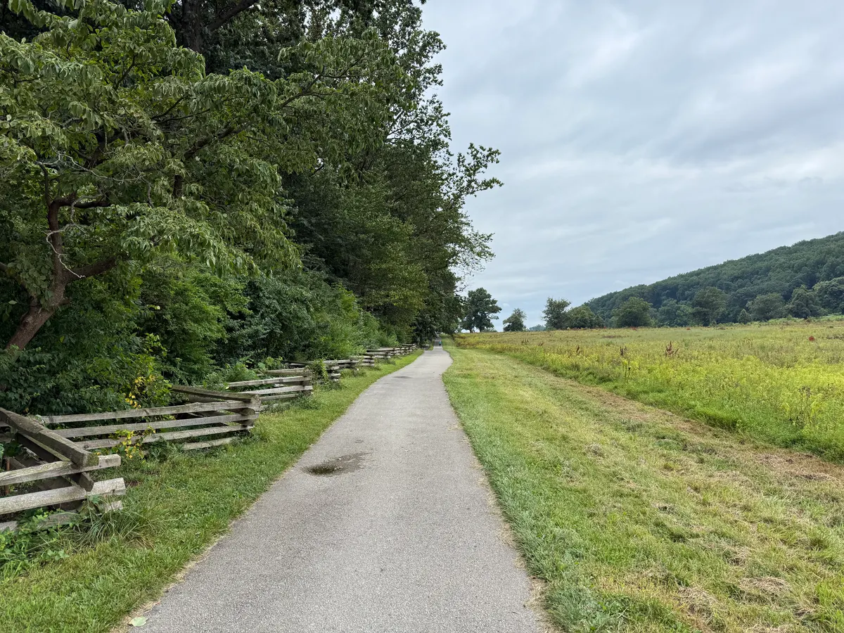 The paved Joseph Plumb Martin Trail crossing the Valley Forge landscape